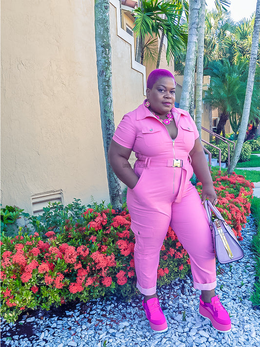 Show off your sexy figure In this zip-up front jumpsuit for women. The color vibrant tapered collared, short sleeve paired with a buckle belt. Elasticated waist Front pockets Back pockets detachable buckle. Jumpsuits can be dress up in some heels or dress down in sneakers with the pants foot roll up