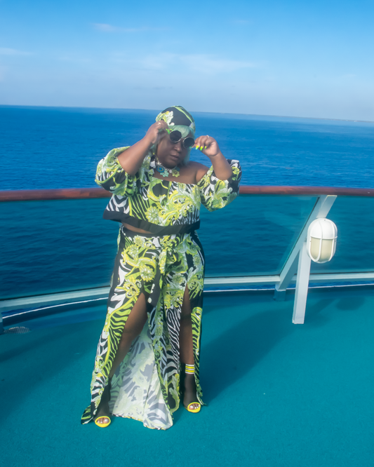 Off The Shoulder Zebra Print Romper Set 3/4 puffy sleeves with elastic, high waist, high slit flare pants showing off your sexy legs. also a matching head wrap, Neon Colors with Animal Prints.