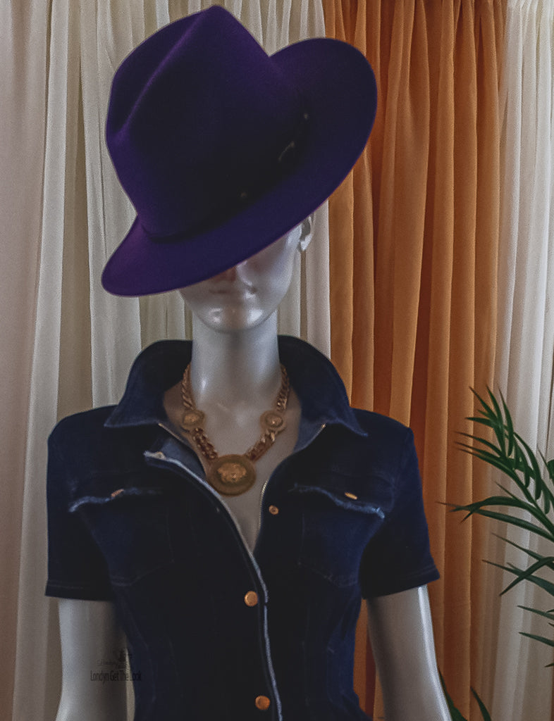 Rock my world in these two tone classic stylish Fedora Felt Hat features a wide Brim, leather belt with buckle panama style. Ready to turn head? Can be worn with any of our jeans from the Jeans out denim Collection a bustier/crop top with heels to bring out that fashionable fashionista in you.