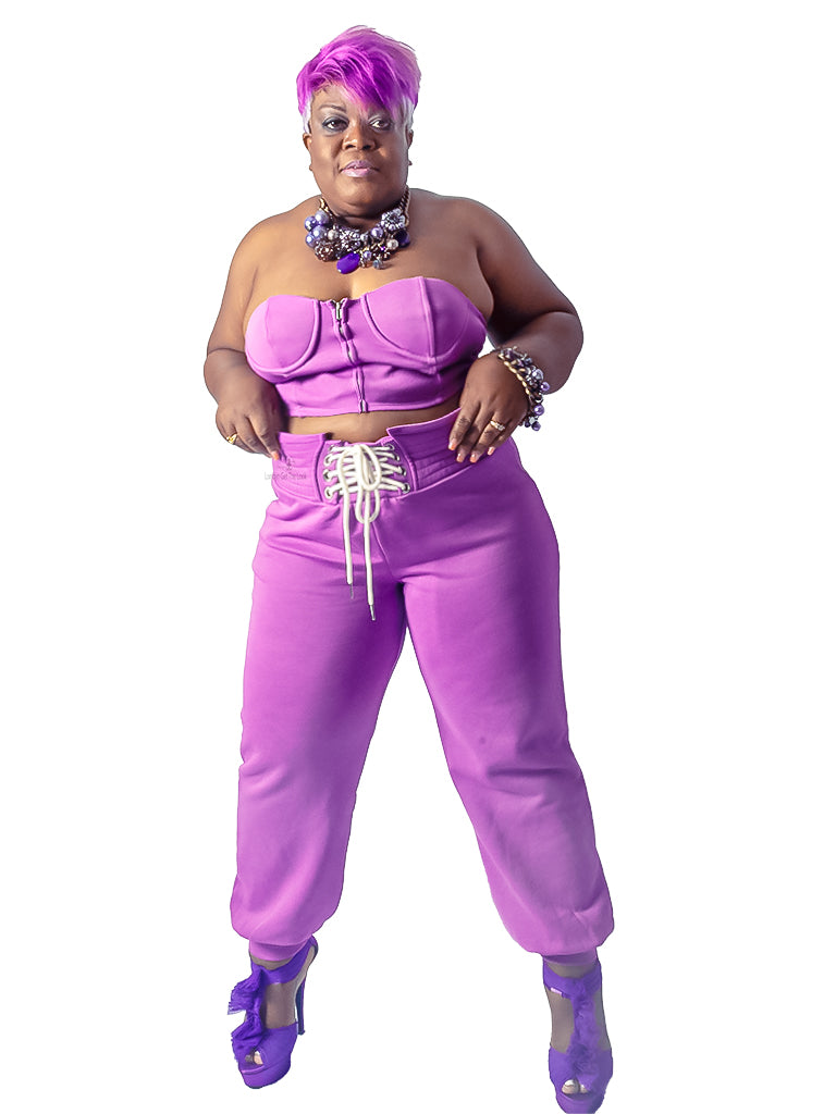 Jersey knit sets, two piece sets, lavender, bustier top paired with matching jogger pants featuring zipper closure at front, elasticated waist, waist shoe tie detail at front. Pair these matching sets with our Necklace from Londyn Jewels collection or Shady Londyn Sunglasses to get the look.