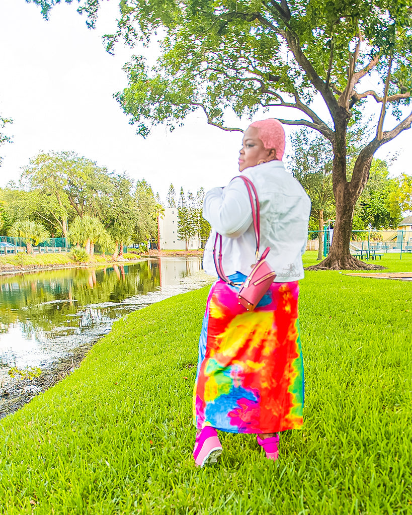 Our Candy Girl Tie-Dye Dress is amazing! Straight ankle length, tank top detail featuring a u neckline, gorgeous multi color, has stretch the fabric hugs your curves, can be dressed up with heels or dress down with a denim Jacket and sneakers, can also accessories with jewelry and a small over the shoulder bag