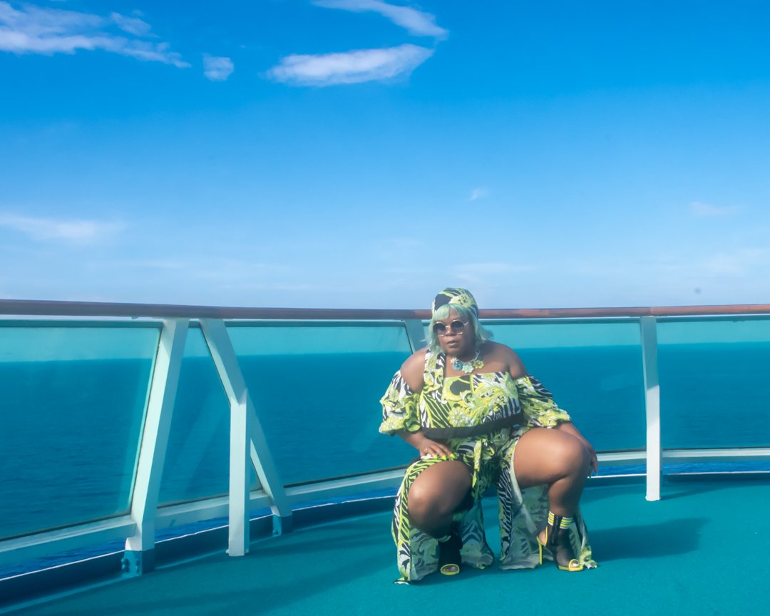 Off The Shoulder Zebra Print Romper Set 3/4  puffy sleeves with elastic, high waist, high slit flare pants showing off your sexy legs. also a matching head wrap, Neon Colors with Animal Prints.