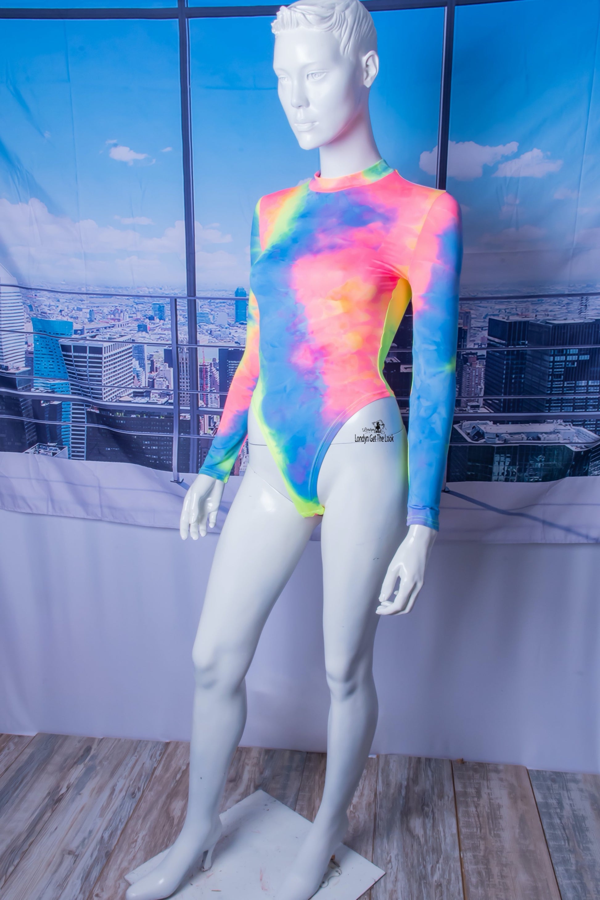 The most hottest and trendy fashion all in one outfit. Tie-Dye Bodysuit & Shorts Set, soft and comfy! Tie-Dye Featuring long sleeve bodysuit paired with drawstring side and scrunch butt booty sports shorts Detail V Neck A Combination To Die For