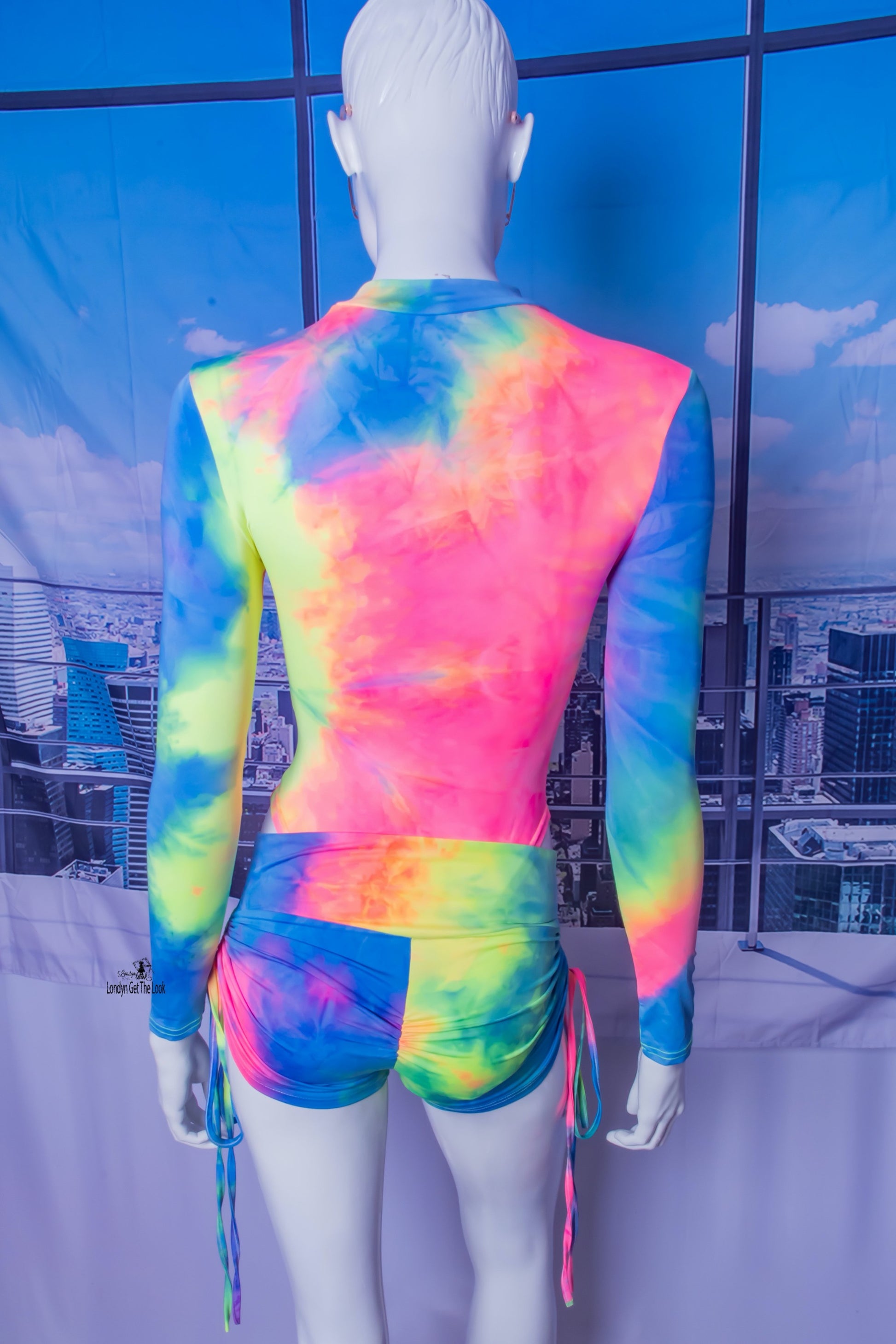 The most hottest and trendy fashion all in one outfit. Tie-Dye Bodysuit & Shorts Set, soft and comfy! Tie-Dye Featuring long sleeve bodysuit paired with drawstring side and scrunch butt booty sports shorts Detail V Neck A Combination To Die For