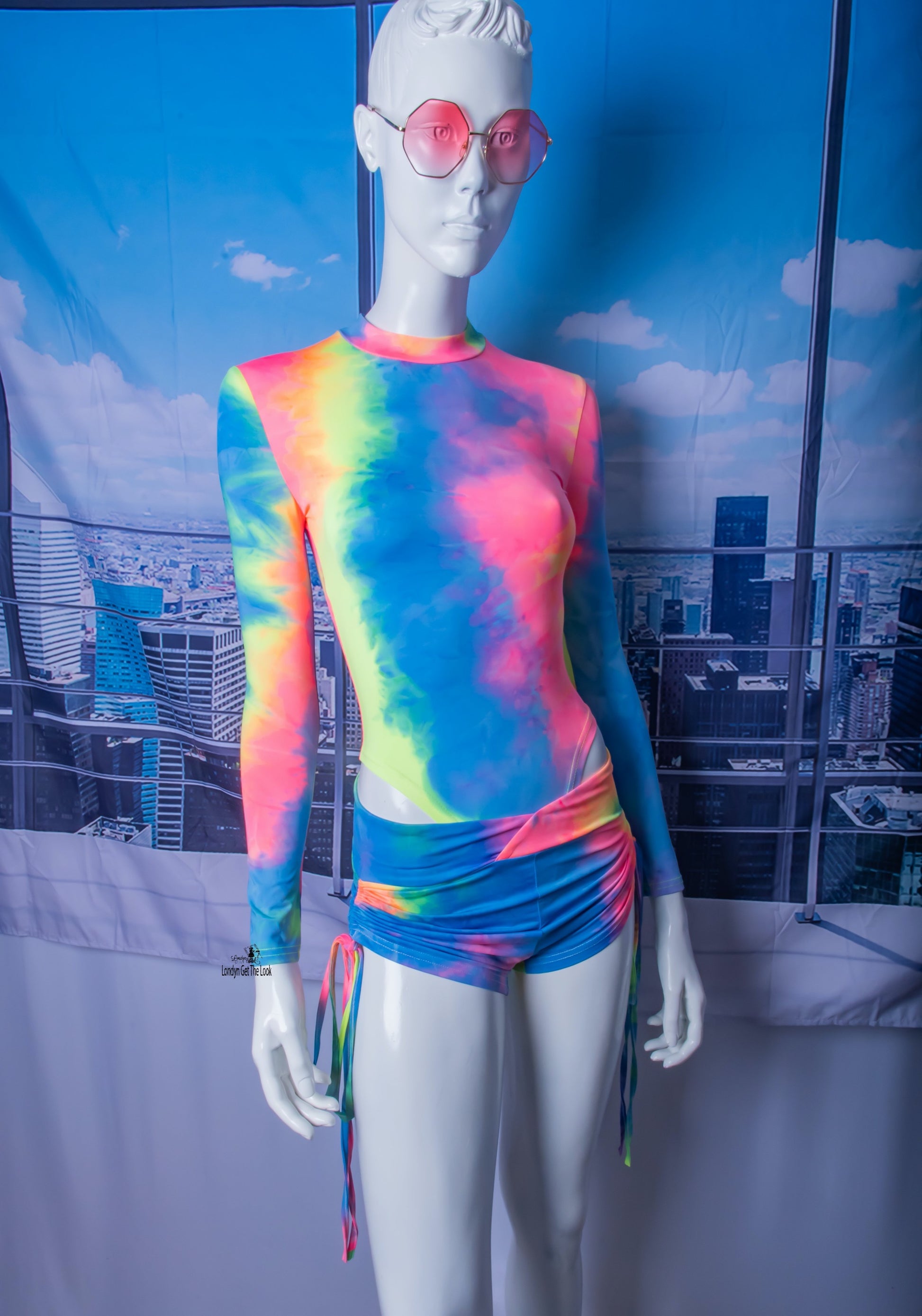 The most hottest and trendy fashion all in one outfit. Tie-Dye Bodysuit & Shorts Set, soft and comfy! Tie-Dye Featuring long sleeve bodysuit paired with drawstring side and scrunch butt booty sports shorts Detail V Neck A Combination To Die For