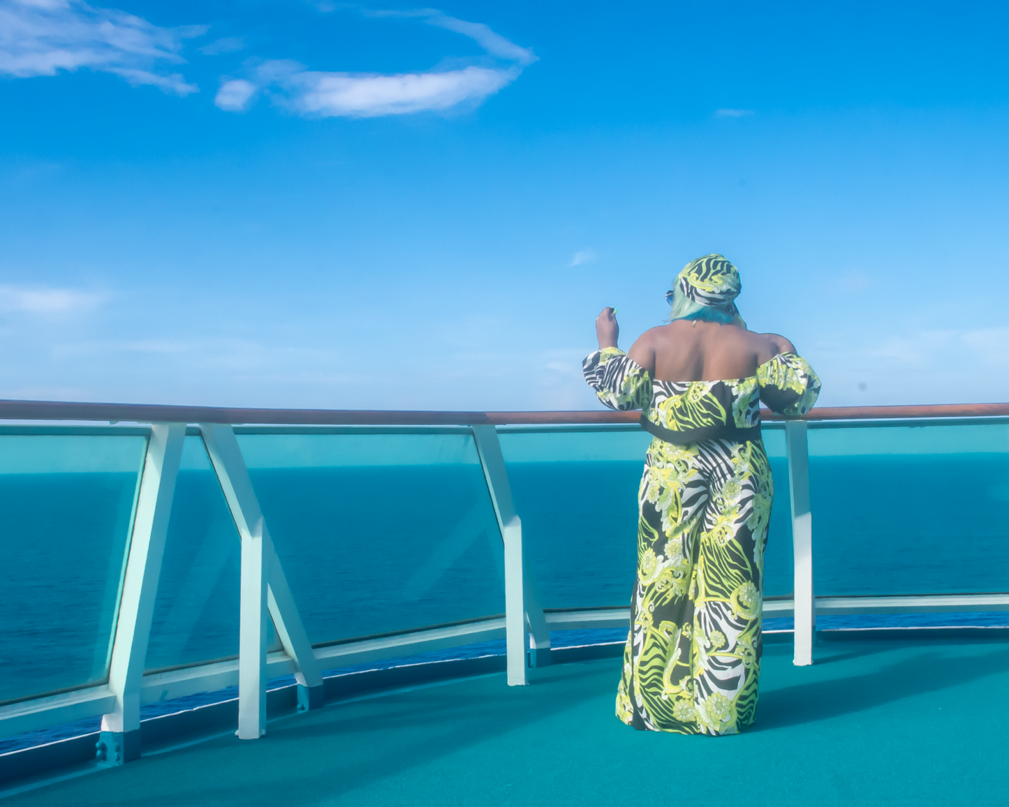 Off The Shoulder Zebra Print Romper Set 3/4  puffy sleeves with elastic, high waist, high slit flare pants showing off your sexy legs. also a matching head wrap, Neon Colors with Animal Prints.