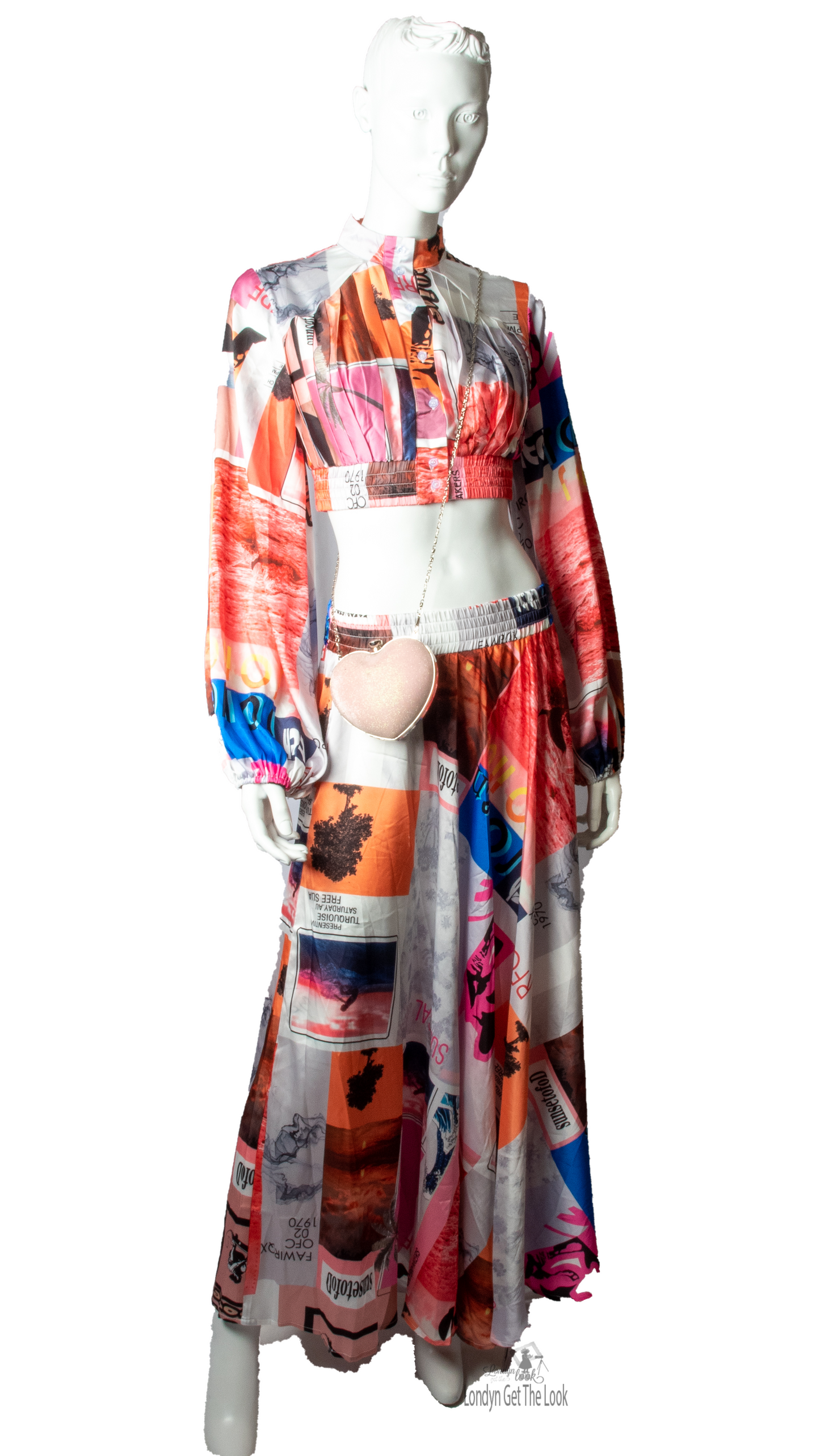 Long Sleeve Print Two Piece Set Top & Skirt featuring a button front top with pleated detail paired with matching dramatic flair maxi length skirt mock neck long puffy sleeve button-front closure with stunning shade of multi colors