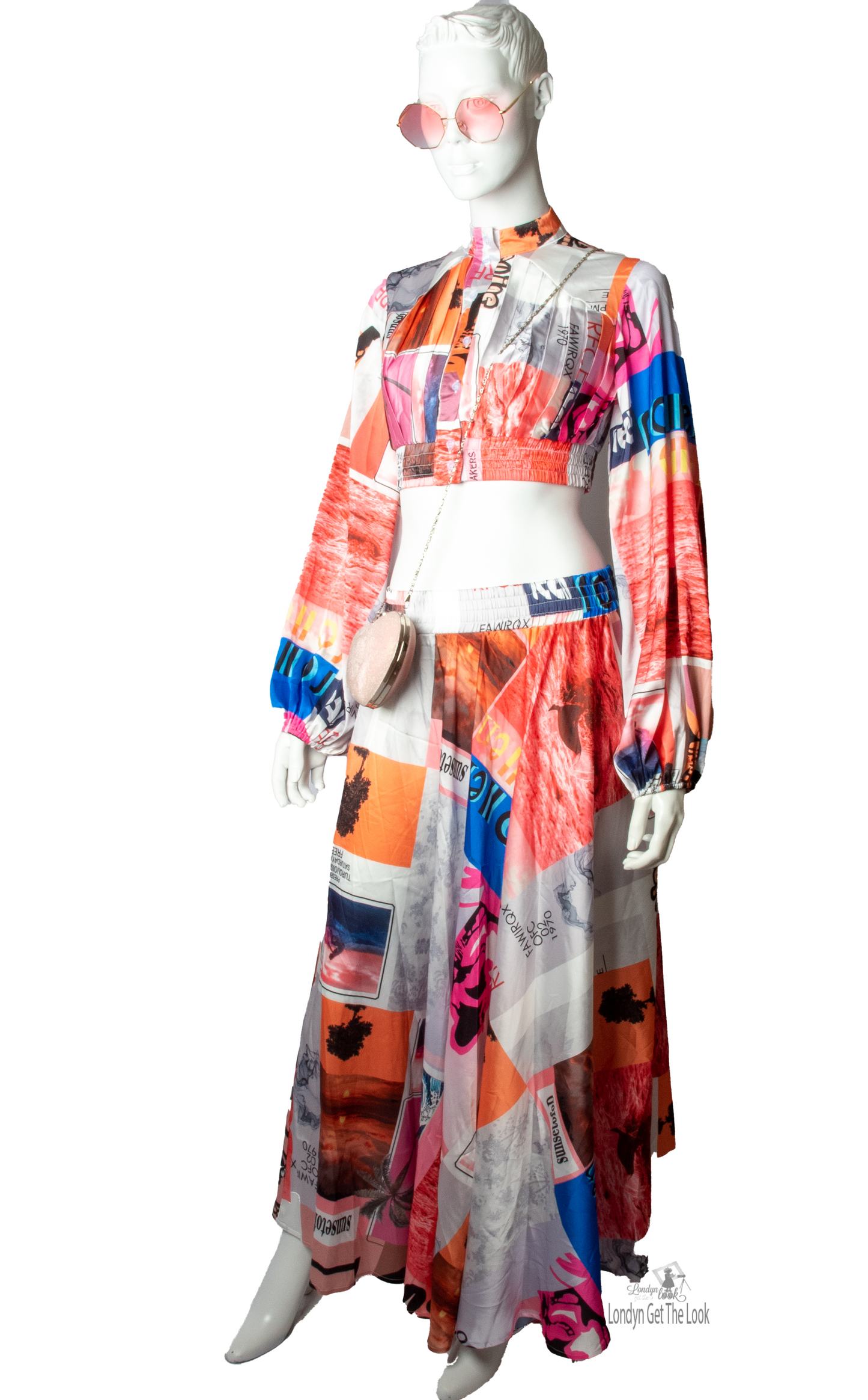 Long Sleeve Print Two Piece Set Top & Skirt featuring a button front top with pleated detail paired with matching dramatic flair maxi length skirt mock neck long puffy sleeve button-front closure with stunning shade of multi colors