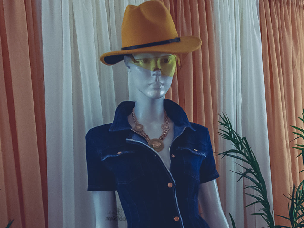 Rock my world in these two tone classic stylish Fedora Felt Hat features a wide Brim, leather belt with buckle panama style. Ready to turn head? Can be worn with any of our jeans from the Jeans out denim Collection a bustier/crop top with heels to bring out that fashionable fashionista in you.