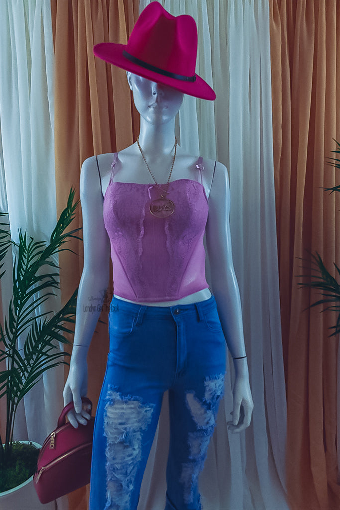 Rock my world in these two tone classic stylish Fedora Felt Hat features a wide Brim, leather belt with buckle panama style. Ready to turn head? Can be worn with any of our jeans from the Jeans out denim Collection a bustier/crop top with heels to bring out that fashionable fashionista in you.
