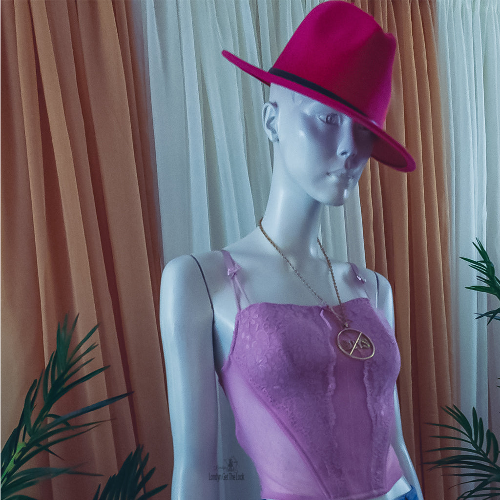 Rock my world in these two tone classic stylish Fedora Felt Hat features a wide Brim, leather belt with buckle panama style. Ready to turn head? Can be worn with any of our jeans from the Jeans out denim Collection a bustier/crop top with heels to bring out that fashionable fashionista in you.