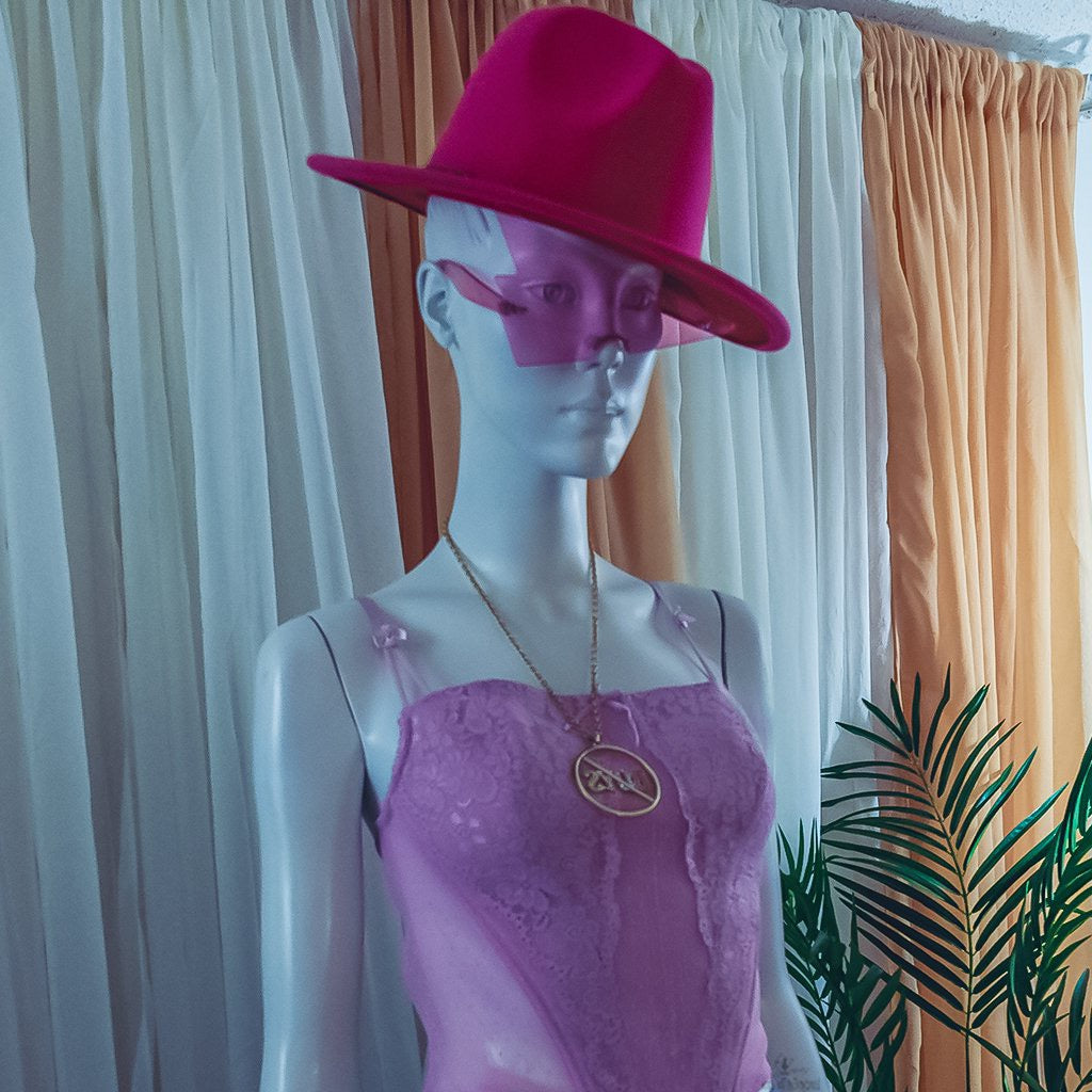 Rock my world in these two tone classic stylish Fedora Felt Hat features a wide Brim, leather belt with buckle panama style. Ready to turn head? Can be worn with any of our jeans from the Jeans out denim Collection a bustier/crop top with heels to bring out that fashionable fashionista in you.