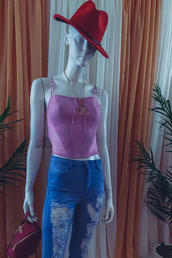 Rock my world in these two tone classic stylish Fedora Felt Hat features a wide Brim, leather belt with buckle panama style. Ready to turn head? Can be worn with any of our jeans from the Jeans out denim Collection a bustier/crop top with heels to bring out that fashionable fashionista in you.