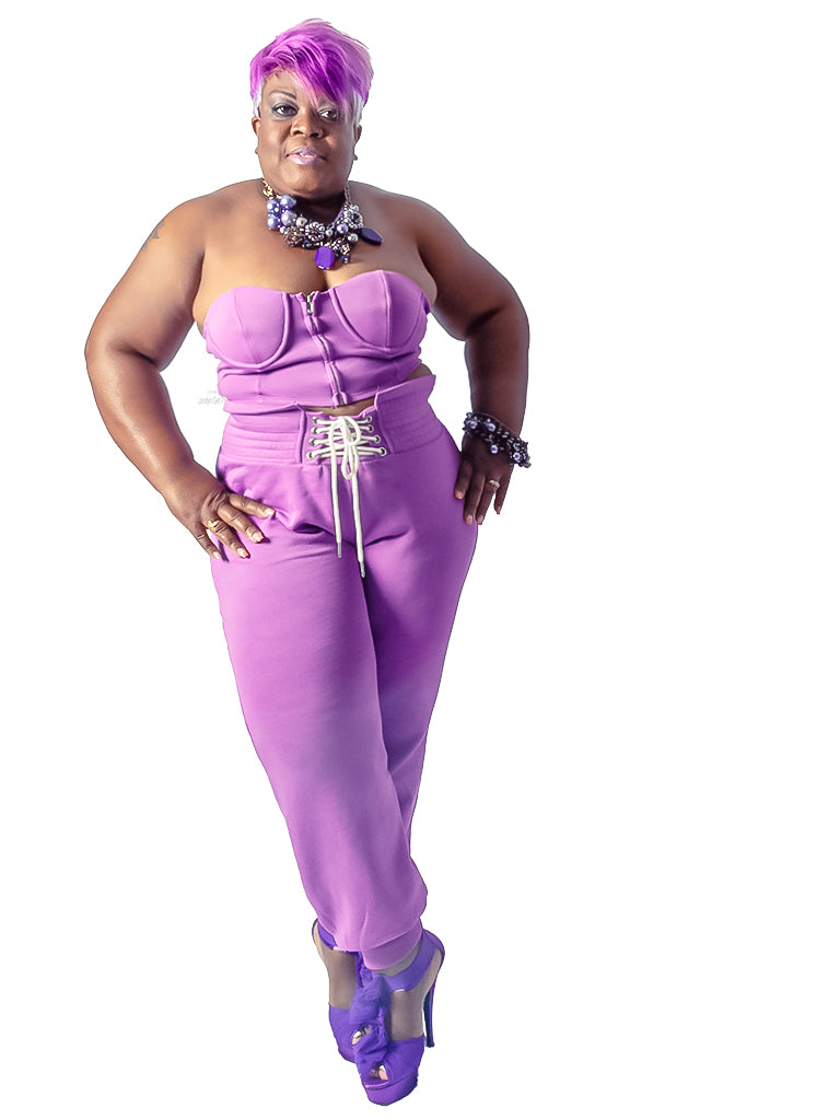 Jersey knit sets, two piece sets, lavender, bustier top paired with matching jogger pants featuring zipper closure at front, elasticated waist, waist shoe tie detail at front. Pair these matching sets with our Necklace from Londyn Jewels collection or Shady Londyn Sunglasses to get the look.
