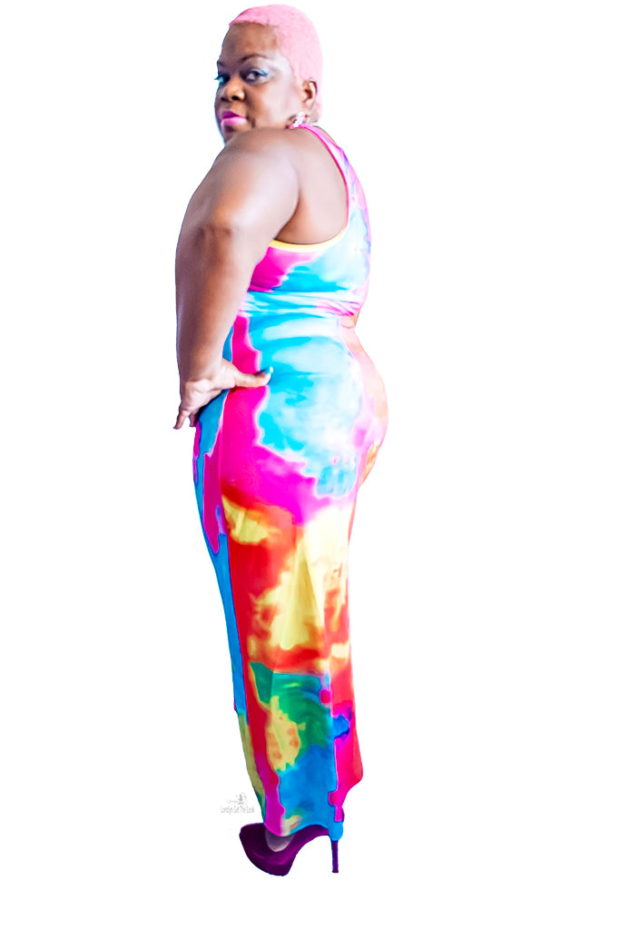 Our Candy Girl Tie-Dye Dress is amazing!  Straight ankle length, tank top detail featuring a u neckline, gorgeous multi color, has stretch the fabric hugs your curves, can be dressed up with heels or dress down with a denim Jacket and sneakers, can also accessories with jewelry and a small over the shoulder bag 